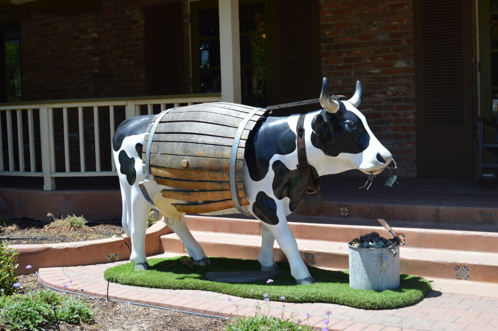 sculpture of a cow dressed in a barrel in Paso Robles