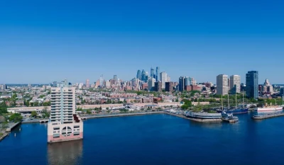 Stunning aerial view of Philadelphia's skyline and waterfront on a clear day.