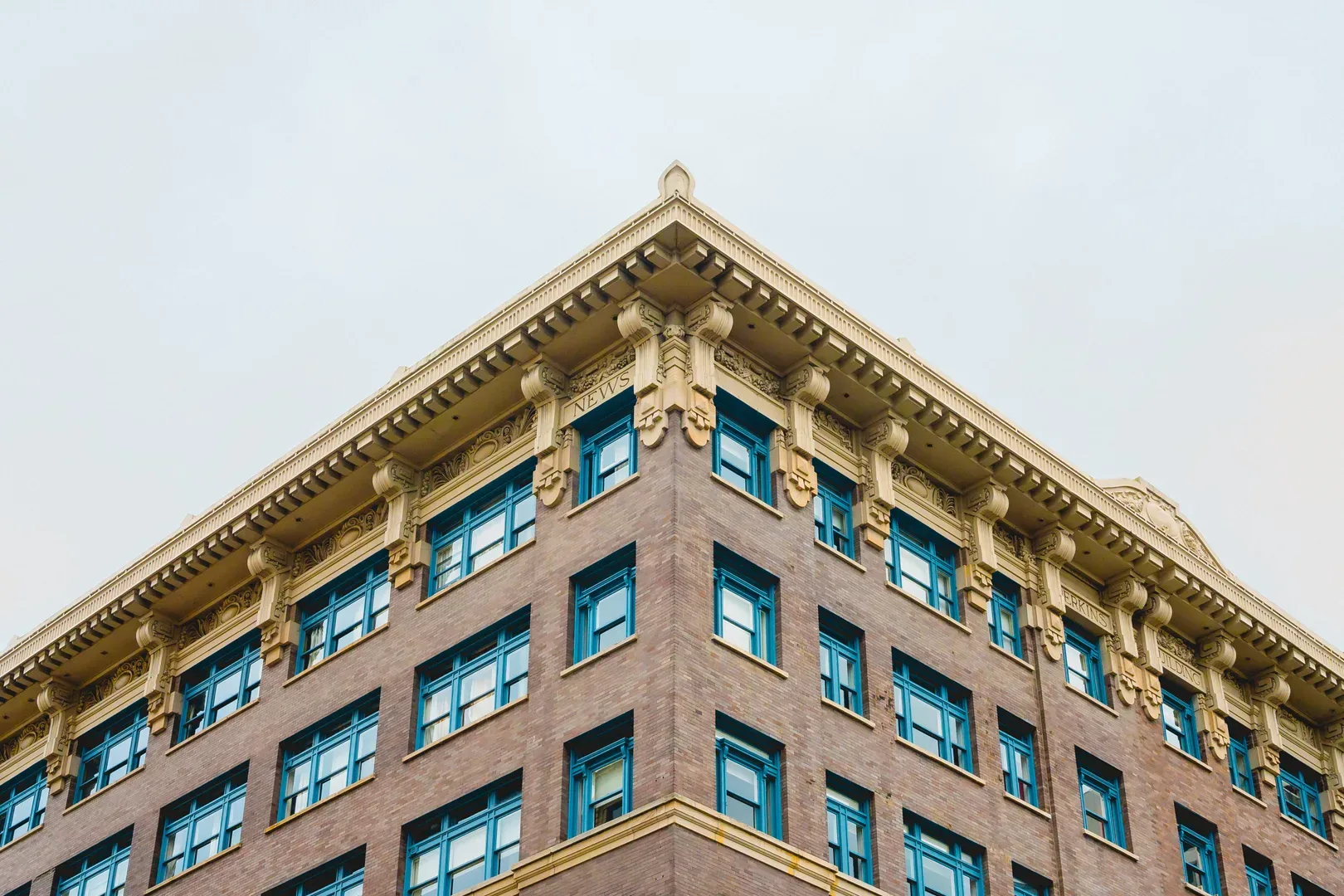 Low angle view of a classic multi-storey building showcasing vintage architecture in Tacoma, WA. in Tacoma Scavenger Hunt, WA