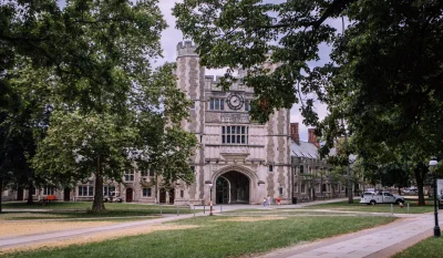 Explore the iconic gothic architecture of Princeton University, surrounded by lush greenery. in Princeton New Jersey Scavenger Hunt, NJ