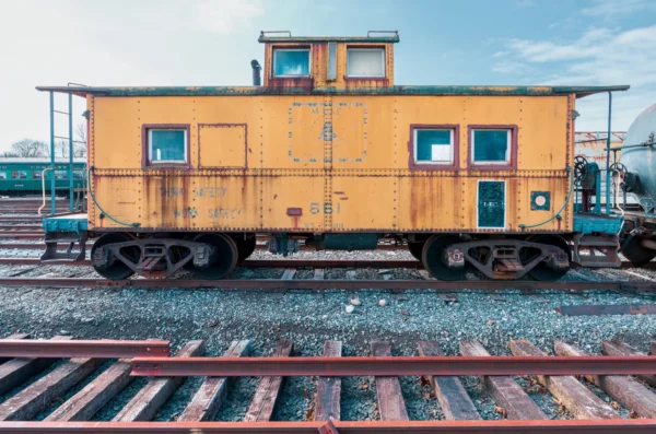 Rustic yellow caboose on train tracks at Danbury Railway Museum in Connecticut, USA. in Danbury Scavenger Hunt, CT
