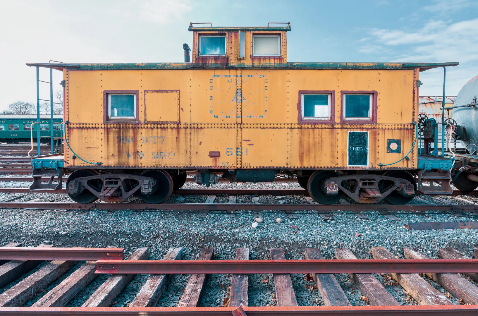 Rustic yellow caboose on train tracks at Danbury Railway Museum in Connecticut, USA. in Danbury Scavenger Hunt, CT