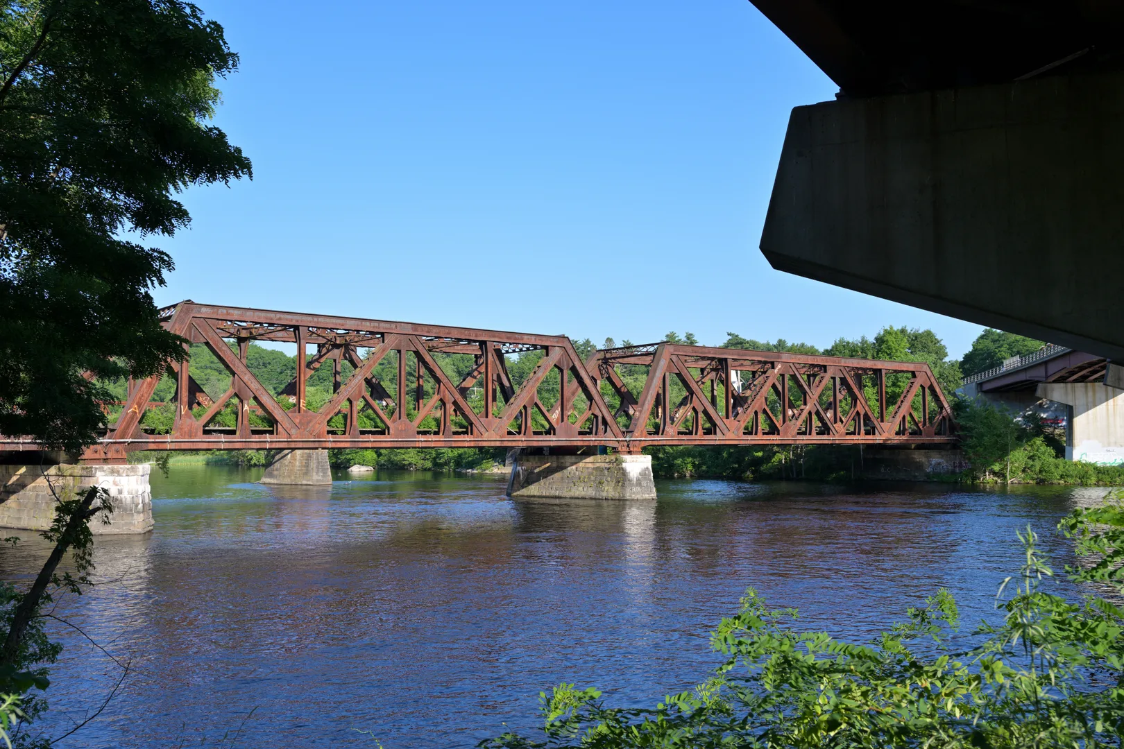 Nashua Subdivison railway bridge over Merrimack River in Hooksett, NH June 2026.jpg in Nashua Scavenger Hunt, NH