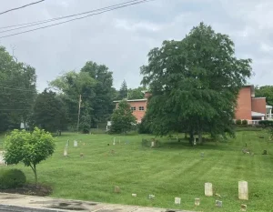 This is a view of the upper building of the former Greenbrier College as well as the Dick Pointer Cemetery.jpg in Lewisburg West Virginia Scavenger Hunt, WV