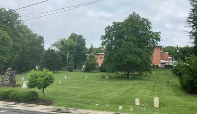 This is a view of the upper building of the former Greenbrier College as well as the Dick Pointer Cemetery.jpg in Lewisburg West Virginia Scavenger Hunt, WV