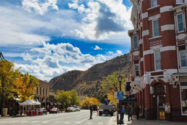 a group of people standing on the side of a road in Durango Scavenger Hunt, CO