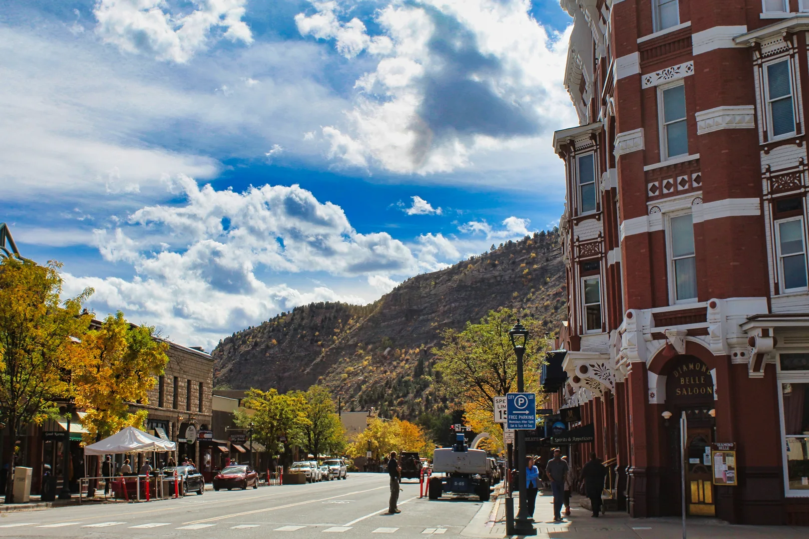 a group of people standing on the side of a road in Durango Scavenger Hunt, CO