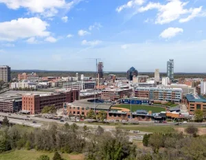 Aerial photo showing downtown Durham's vibrant skyline and cityscape on a sunny day. in Durham Scavenger Hunt, NC