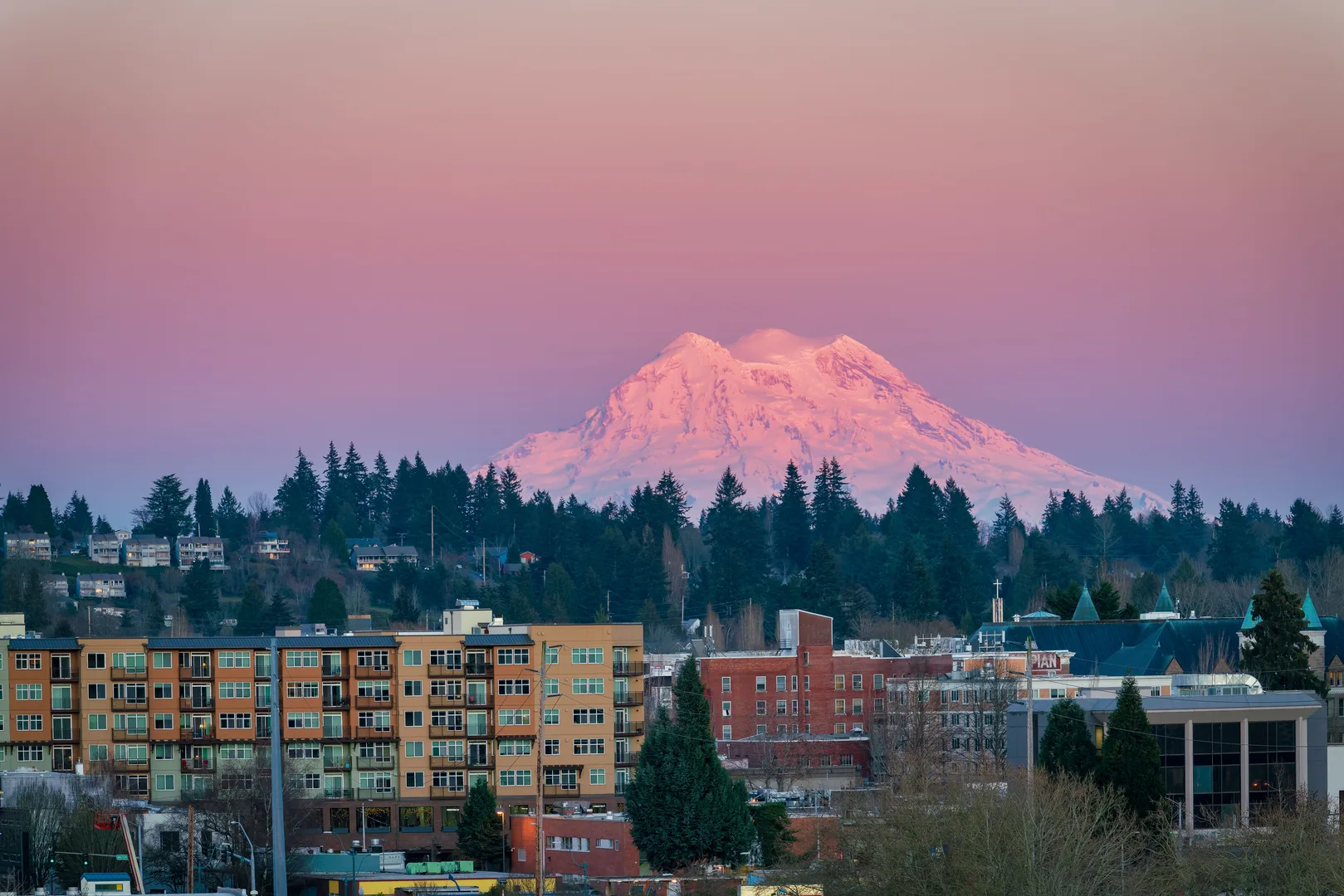 Breathtaking view of Olympia cityscape with Mount Rainier glowing at sunset. in Olympia Scavenger Hunt, WA