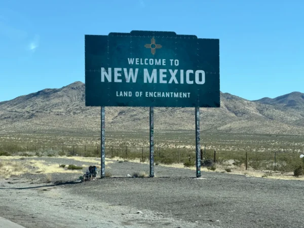 Iconic welcome sign for New Mexico in a desert landscape, tracing the state's enchanting charm. in Las Vegas New Mexico Scavenger Hunt, NM