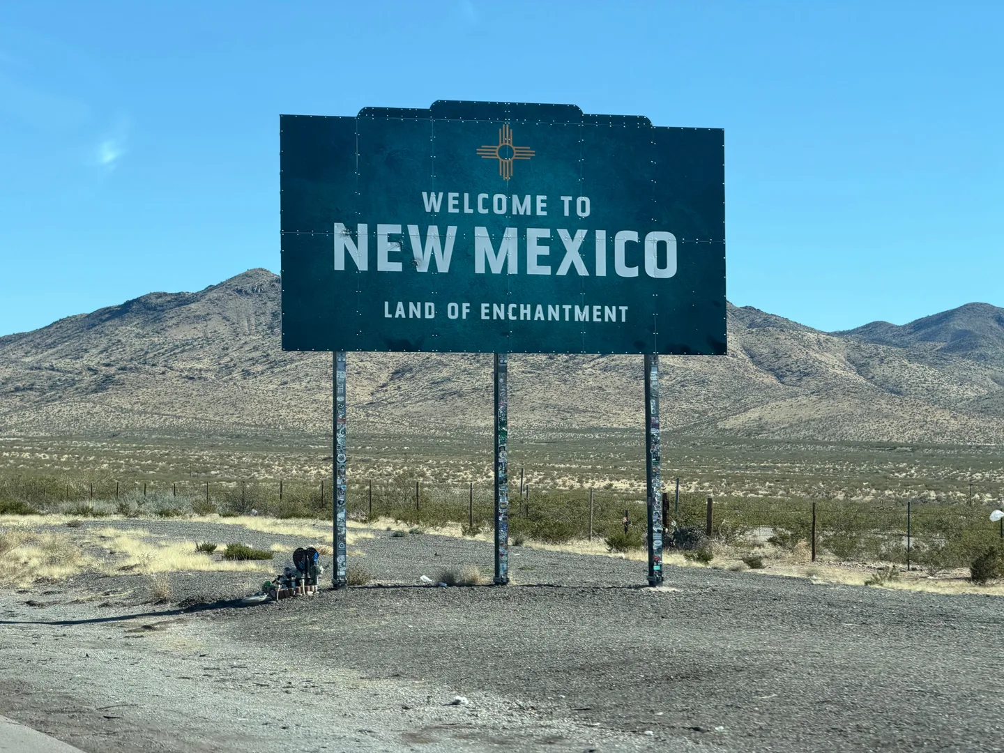 Iconic welcome sign for New Mexico in a desert landscape, tracing the state's enchanting charm. in Las Vegas New Mexico Scavenger Hunt, NM