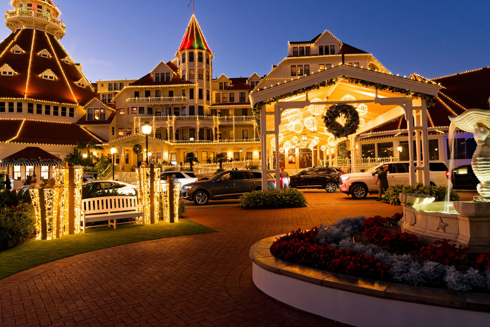 Stunning evening photo of a beautifully lit hotel with festive decorations and vibrant lights. in Coronado Scavenger Hunt