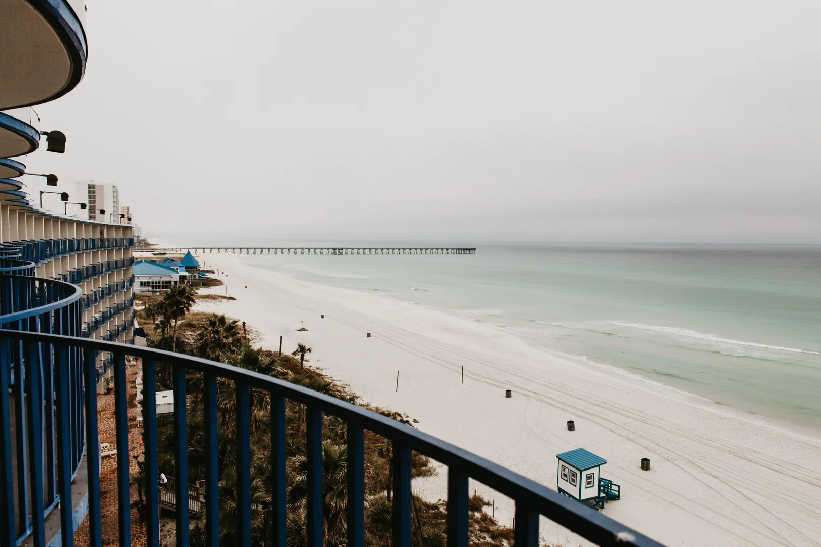 Breathtaking view of Panama City Beach with cloudy skies and turquoise waters. in Panama City Scavenger Hunt, FL