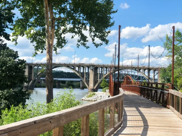 brown wooden bridge over river in Gadsden Scavenger Hunt, AL